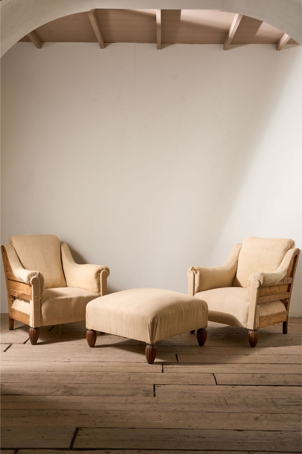 Pair of Art Deco club chairs with matching stool