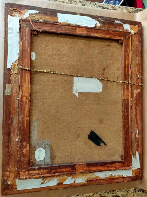 fig 3. An oil on canvas portrait from the 1920s depicting a clergyman in a black coat and collar inside a gold gilt frame.