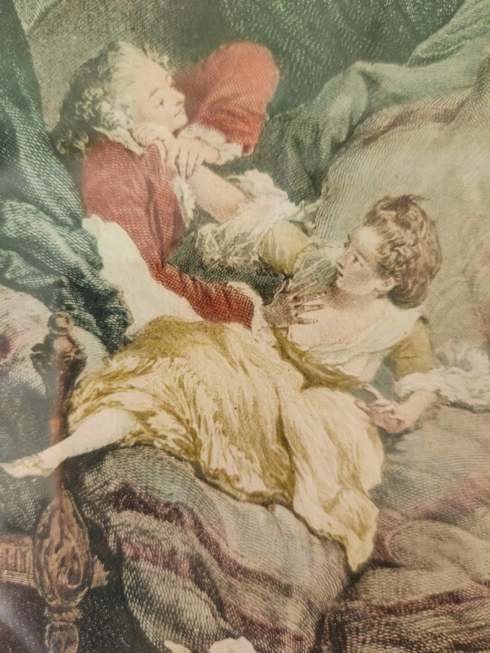 A set of six framed coloured mezzotint engravings depicting eighteenth-century French interior genre scenes, mounted in timber frames. View XI