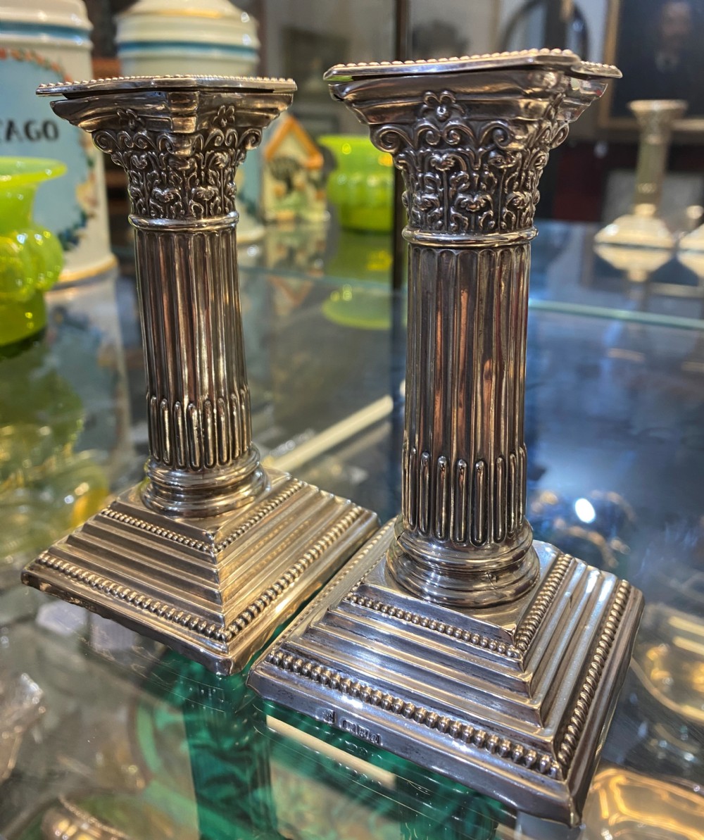 Pair Of Chester Silver Corinthian Column Candlesticks 