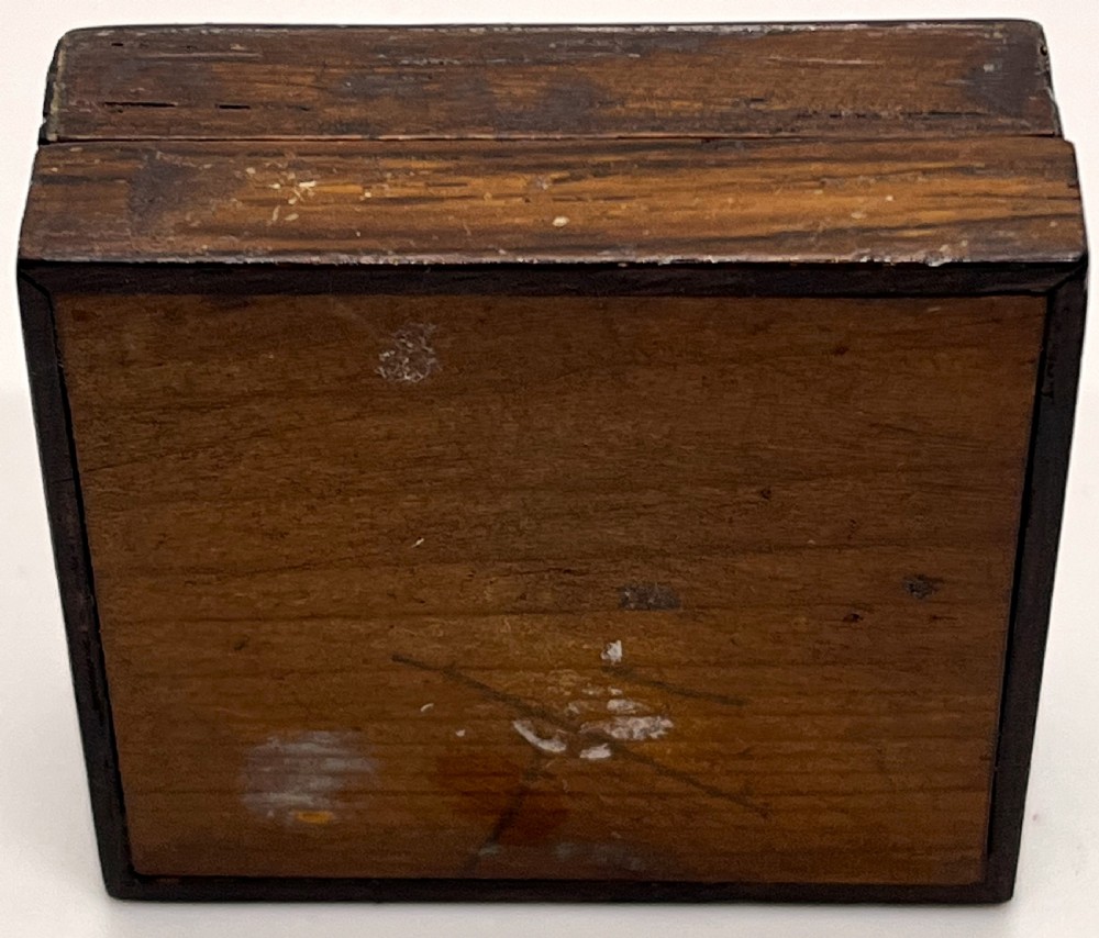 A small square Victorian Tunbridge ware wooden stamp box featuring a geometric inlaid mosaic border and a central profile portrait of Queen Victoria. View IV