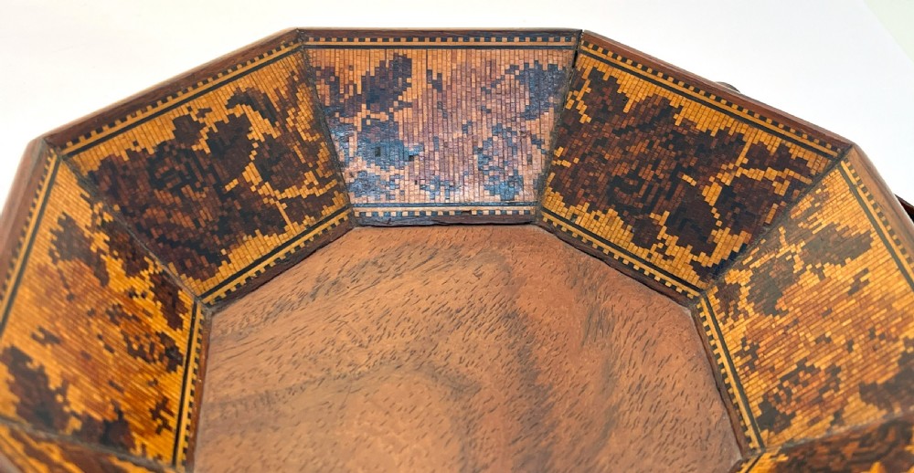 An antique Victorian octagonal rosewood basket with a high overhead handle and intricate micro-mosaic geometric floral wood inlay on the interior panels. View VI