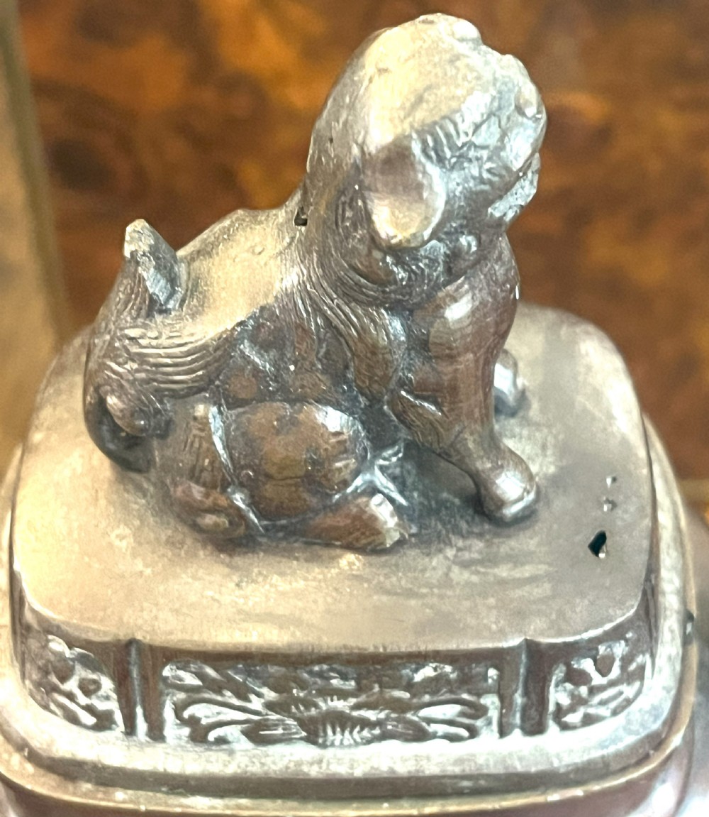 A cast dark bronze Japanese incense burner featuring a shishi guardian dog finial on the lid, floral relief panels, phoenix handles, and beast-head legs. View VI