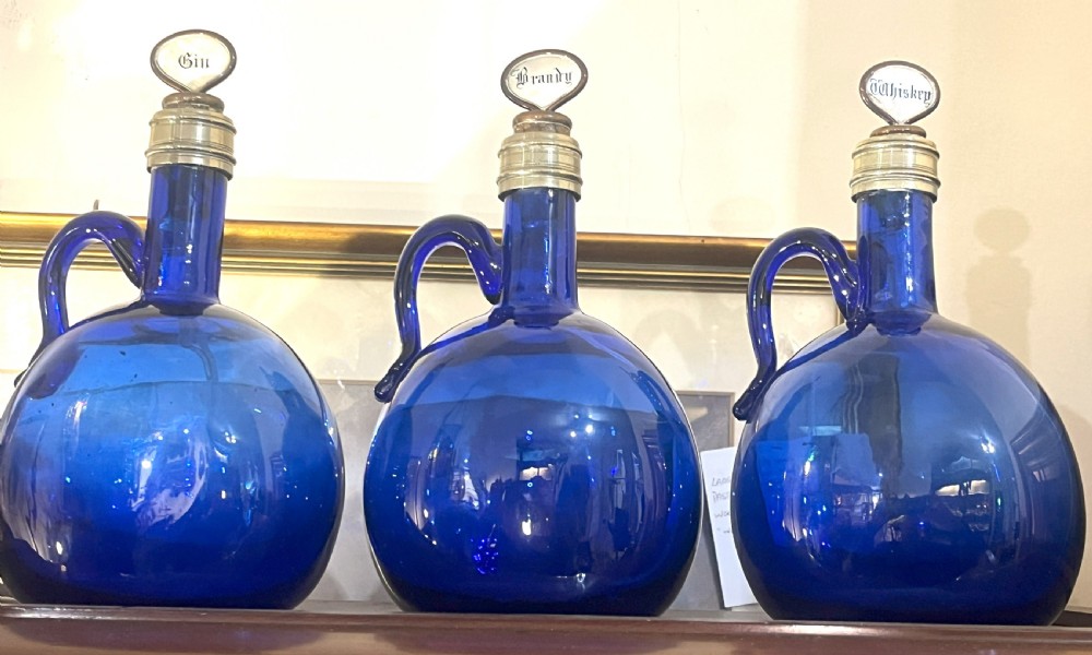 Set Of Three Blue Glass Spirit Decanters