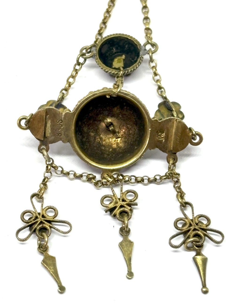 An antique gilded silver filigree pendant necklace featuring light blue enamelled flower motifs and hanging drop accents. View III