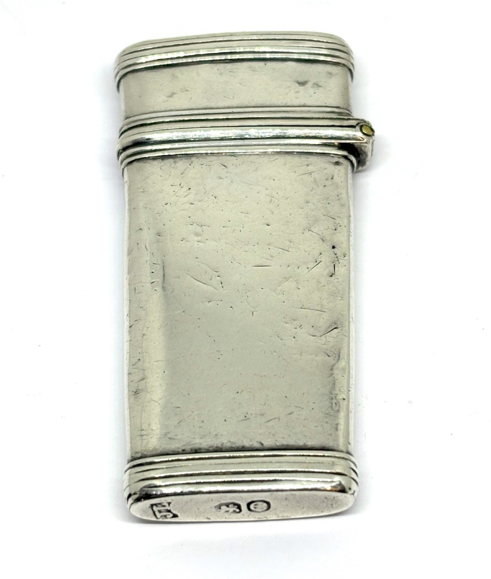 An open Georgian sterling silver case with hallmarked base containing two tortoiseshell-handled instruments. View VI