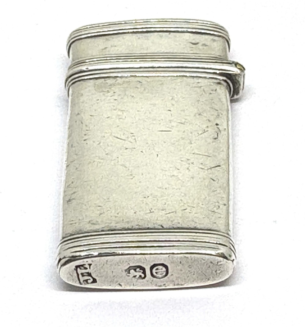 An open Georgian sterling silver case with hallmarked base containing two tortoiseshell-handled instruments. View VII