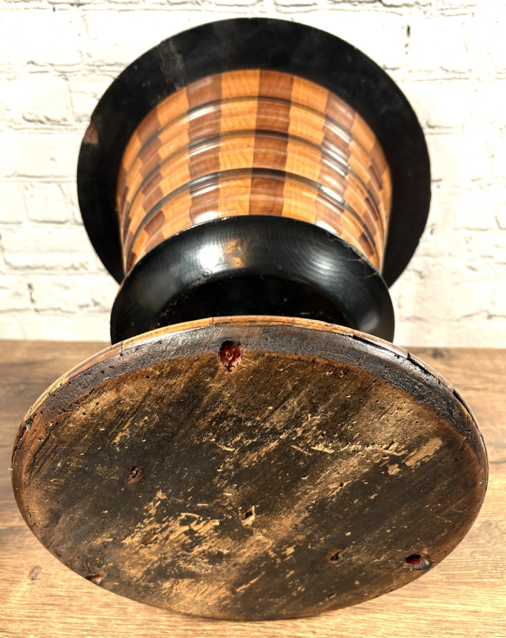 An antique early 19th-century Dutch teestoof featuring staved wood with alternating light and dark stripes, an ebonised rim, pedestal base, and a brass swing handle. View VIII