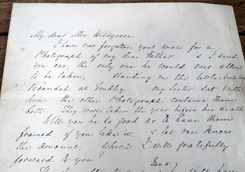 A single sheet of cream paper with dark cursive handwriting signed by Florence Nightingale at the bottom. View III