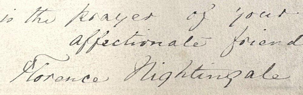 A single sheet of cream paper with dark cursive handwriting signed by Florence Nightingale at the bottom. View V
