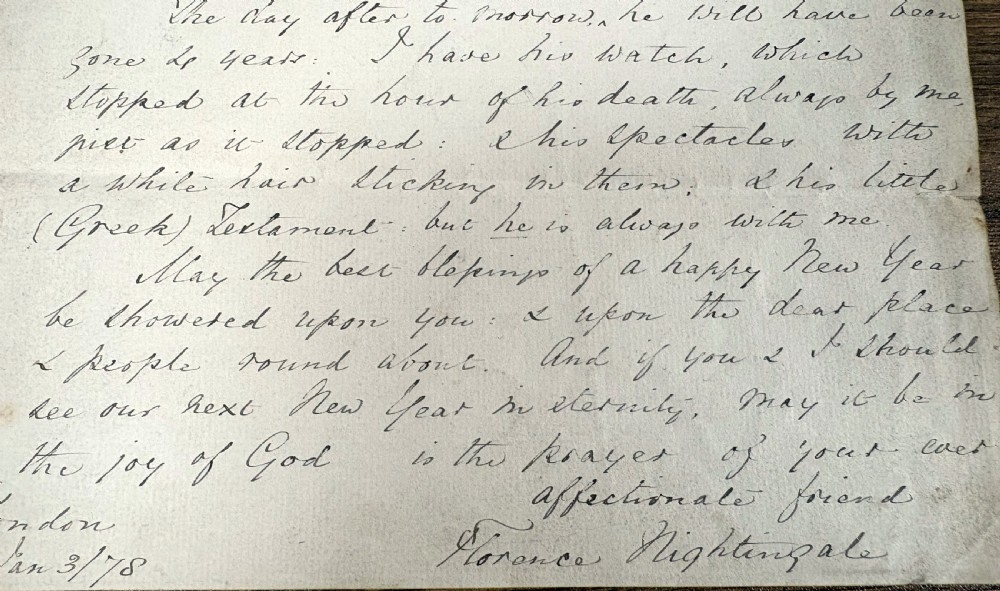 A single sheet of cream paper with dark cursive handwriting signed by Florence Nightingale at the bottom. View VII