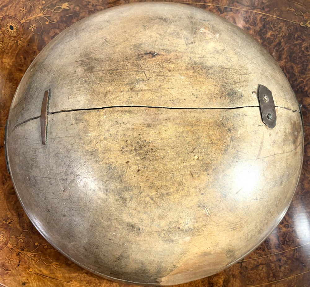 An eighteenth-century hand-turned sycamore wooden bowl displaying a weathered dark grey patina and an authentic historic timber split line. View IV