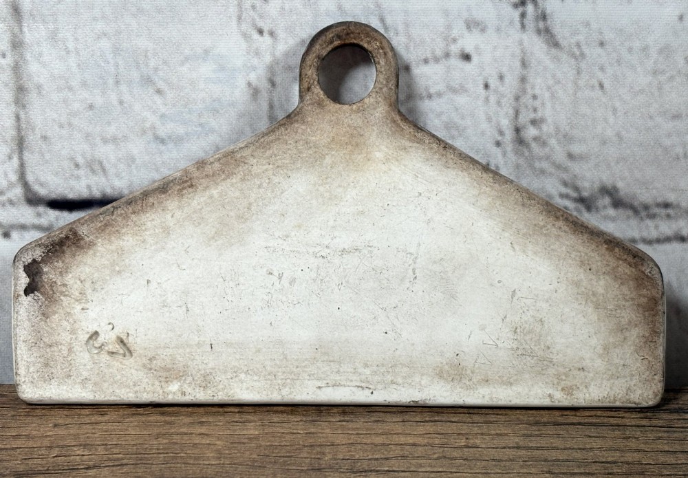 A 19th-century glazed earthenware wine bin label featuring the word SHERRY printed in black typography below a central suspension hole. View II