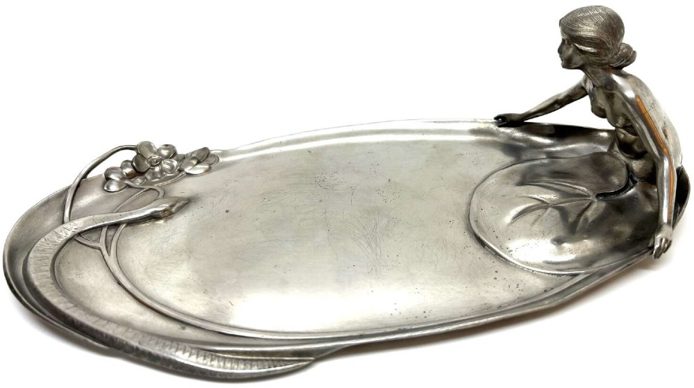 An elongated Art Nouveau silvered pewter card tray featuring a cast figure of a maiden at one end and a serpent coiling around organic leaf detail. View II