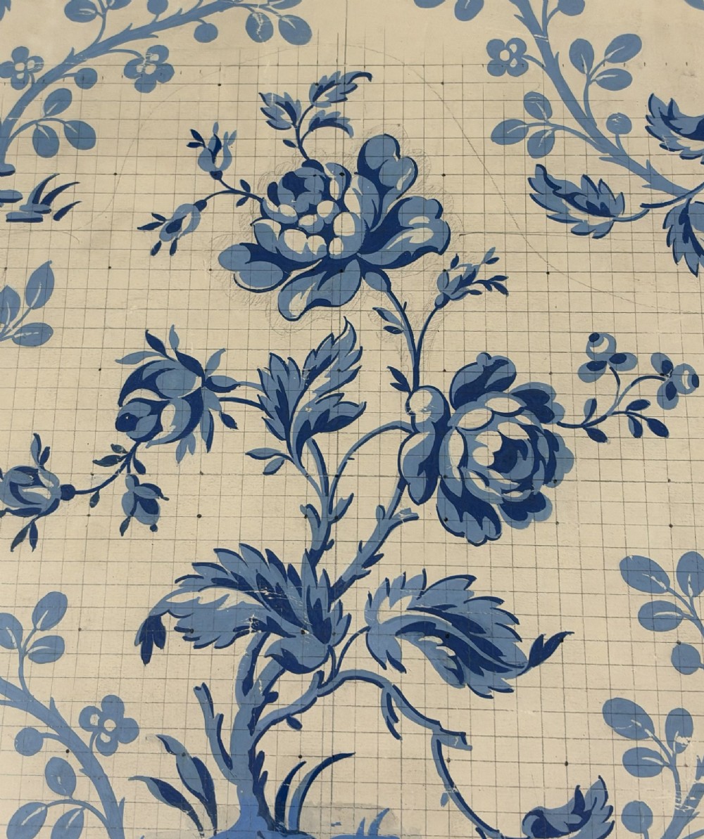 A framed vintage French textile design featuring a blue floral motif rendered on grid paper, complete with technical handwritten annotations and an original manufacturer label. View VII