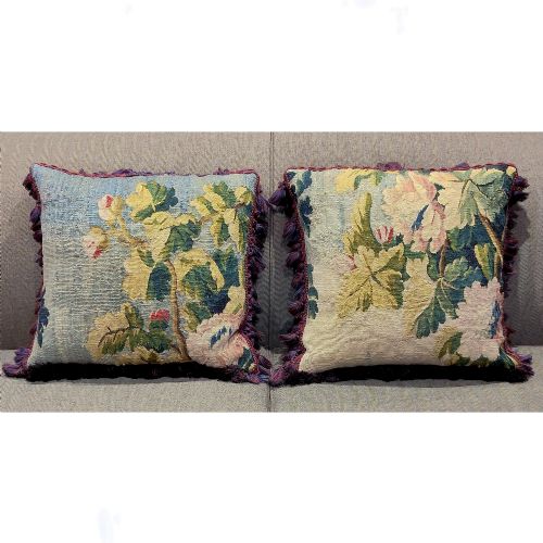 A PAIR OF CUSHIONS OF AUBUSSON VERDURE TAPESTRY