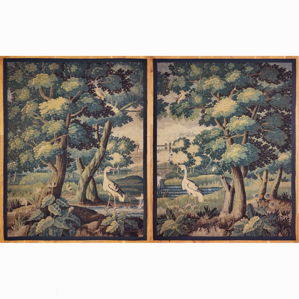A pair of late 17th century Aubusson verdure tapestry panels