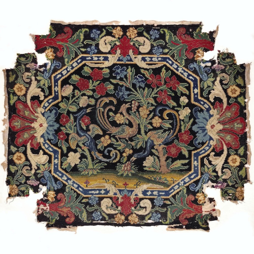 An 18th century French needlework chair seat cover