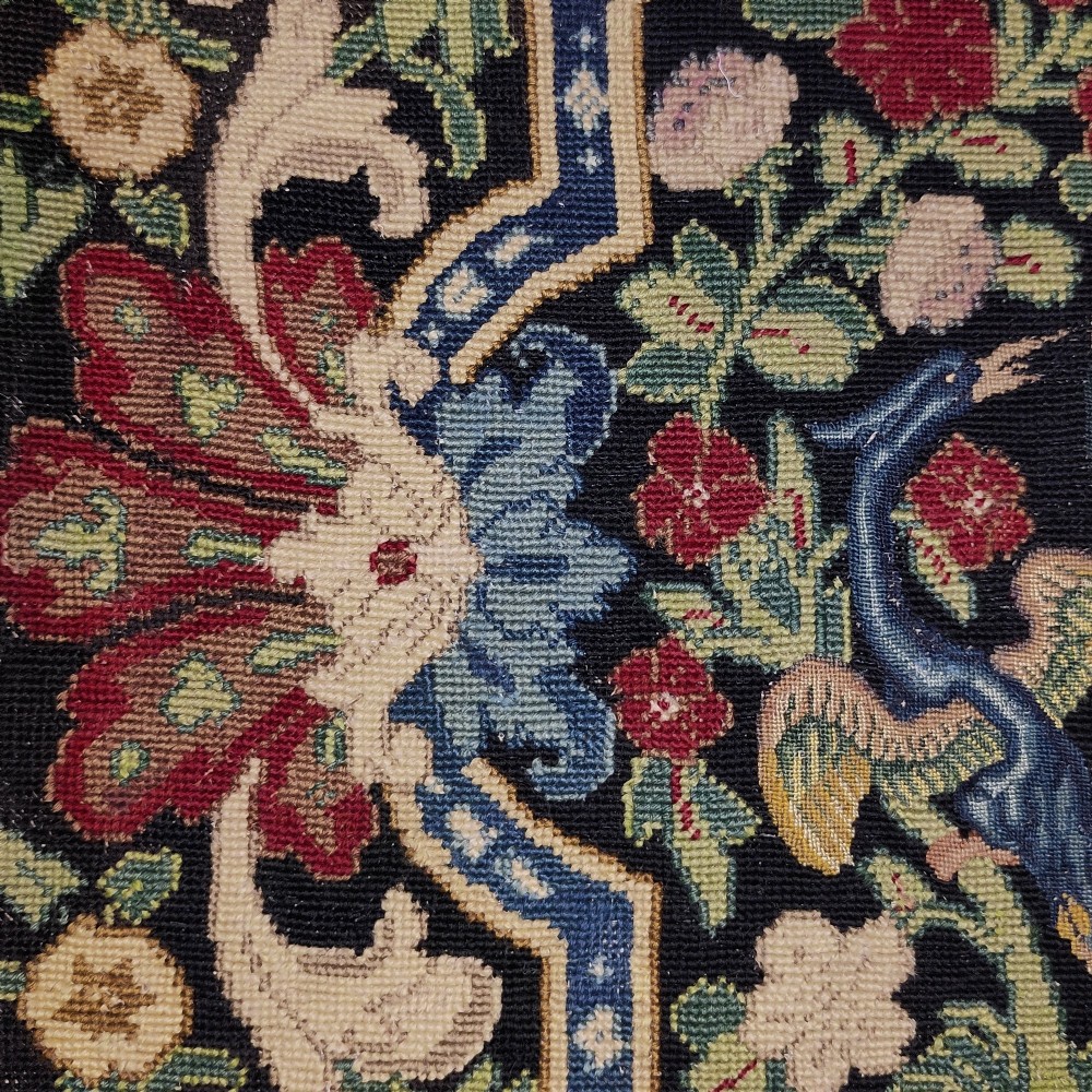 An 18th century French needlework chair seat cover View V