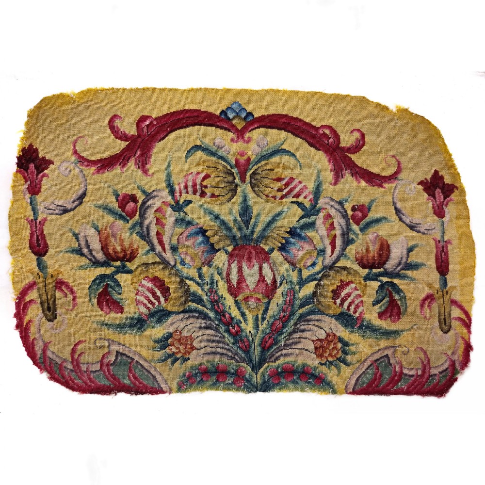 Two eighteenth-century yellow wool and silk needlework textile panels decorated with botanical motifs and acanthus leaf scrollwork for a chair seat and back. View III