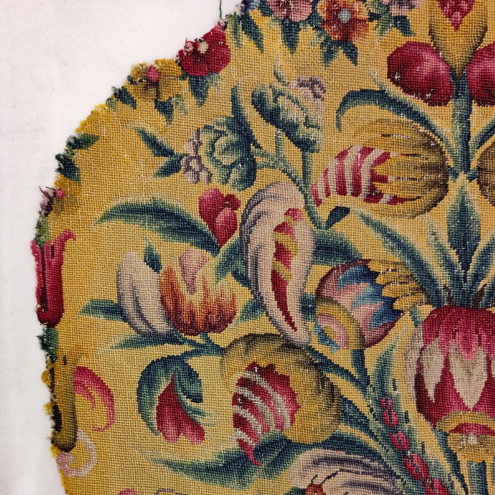 Two eighteenth-century yellow wool and silk needlework textile panels decorated with botanical motifs and acanthus leaf scrollwork for a chair seat and back. View IV