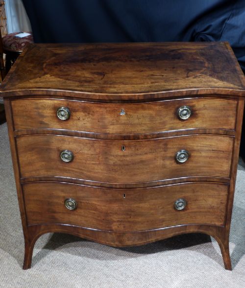 fig 1. Fine quality George III mahogany serpentine chest of drawers