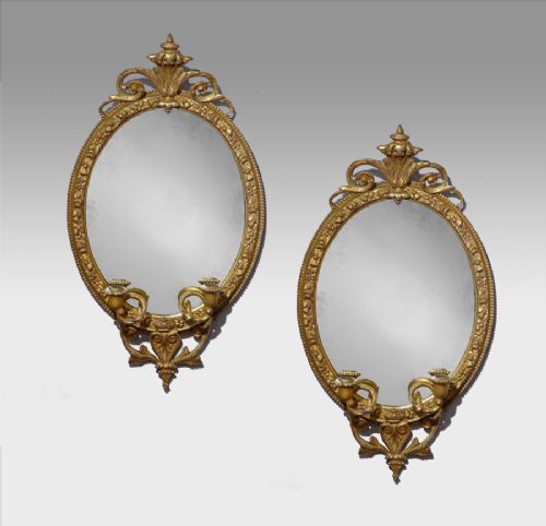 Pair of 19th Century Oval Gilt Mirrors