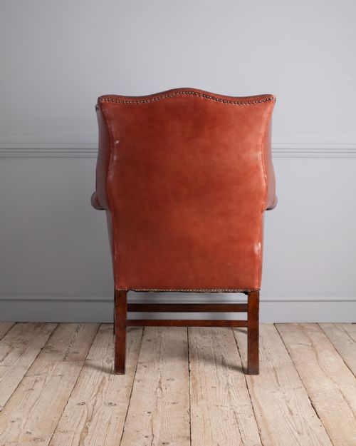GEORGE III MAHOGANY AND LEATHER WING ARM CHAIR - ADDITIONAL PHOTO 4