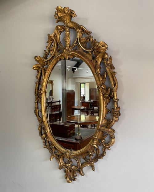 GILTWOOD AND COMPOSITION ROCOCO STYLE OVAL WALL MIRROR - ADDITIONAL PHOTO 2