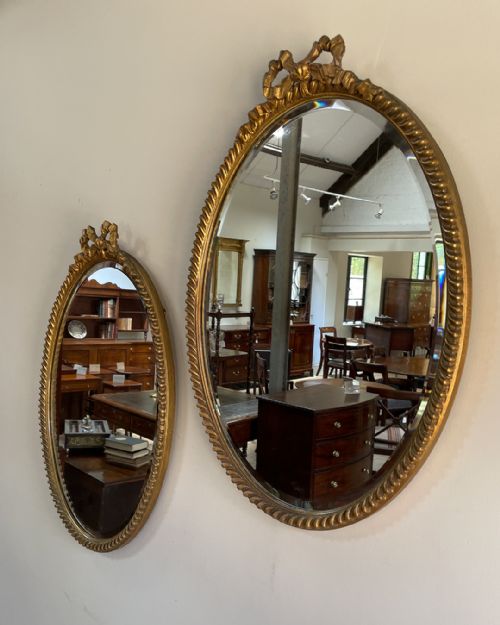 PAIR OF EDWARDIAN OVAL GILT MIRRORS - ADDITIONAL PHOTO 1