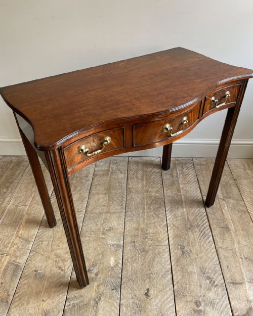 MAHOGANY SERPENTINE SIDE TABLE - ADDITIONAL PHOTO 1