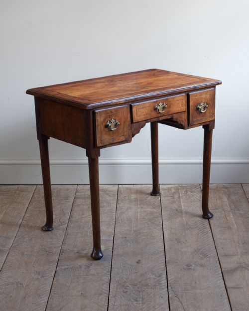 CHARMING GEORGE II WALNUT AND OAK LOWBOY - ADDITIONAL PHOTO 1