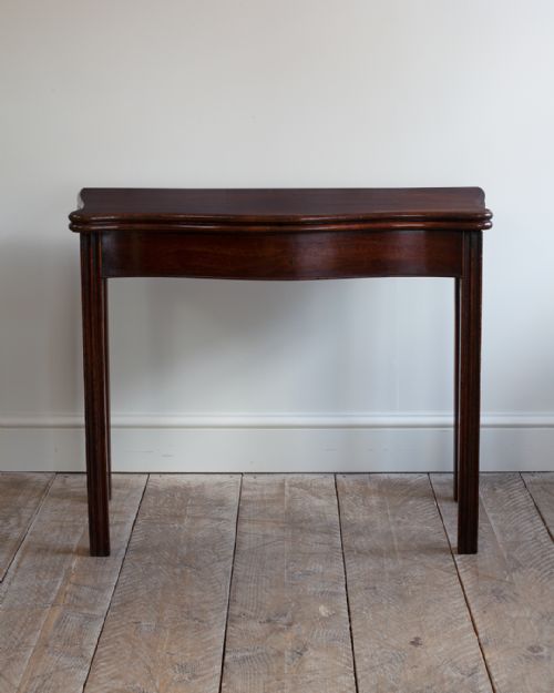 GEORGE III MAHOGANY SERPENTINE CARD TABLE - ADDITIONAL PHOTO 1