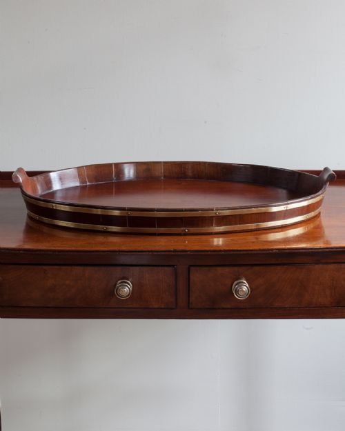 19TH CENTURY MAHOGANY OVAL BRASS BOUND TRAY