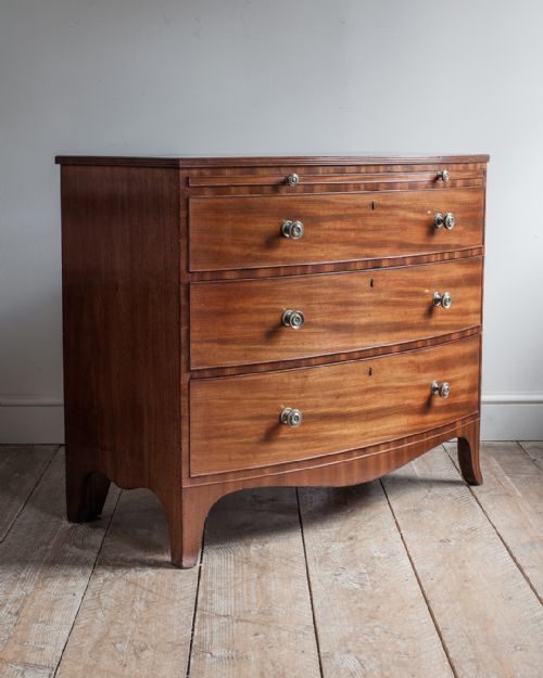 REGENCY MAHOGANY BOWFRONT CHEST OF DRAWERS