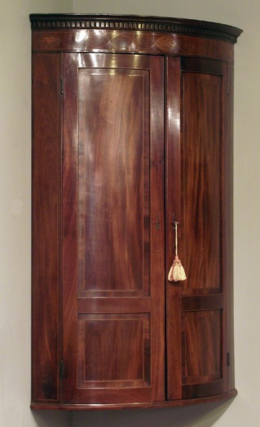 George III mahogany bow front corner cupboard