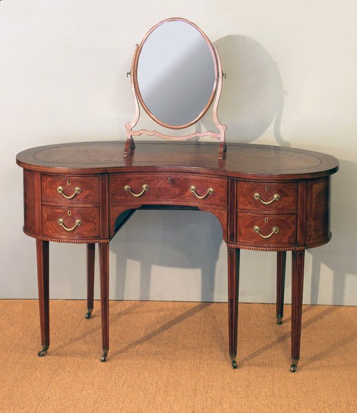 Edwardian kidney shaped mahogany writing table
