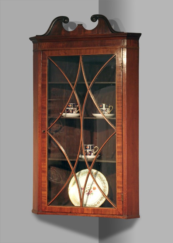 George III mahogany glazed corner cupboard