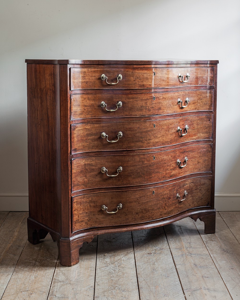 Large George III mahogany serpentine chest of drawers