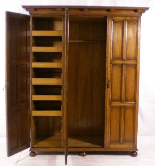 fig 1. Triple Door Oak Hanging Wardrobe