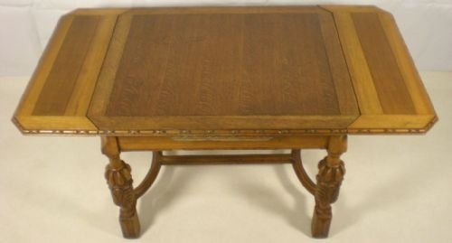 Light Oak Carved Drawleaf Dining Table