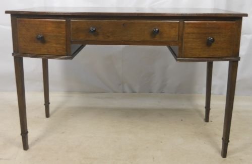 Bow Front Kneehole Writing Table by Waring & Gillow