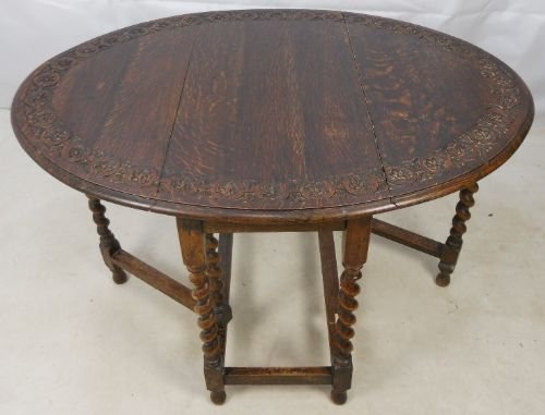 Carved Dark Oak Gateleg Dining Table