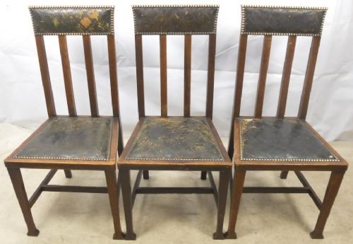 Three Edwardian Oak and Leather Dining Chairs