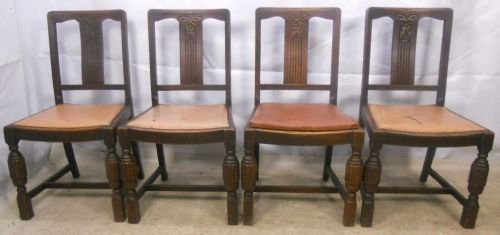 Set of Four Carved Oak Dining Chairs
