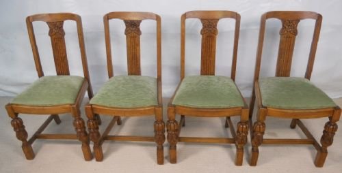 Set of Four Carved Light Oak Dining Chairs