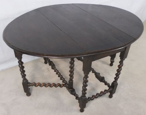 Dark Oak Oval Gateleg Dining Table to Seat Six