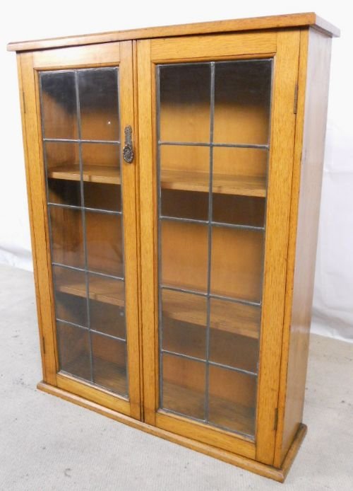 Light Oak Glazed Two Door Bookcase Cabinet