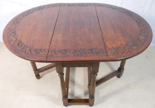 Carved Oak Oval Gateleg Dining Table