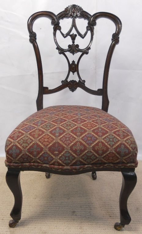 Edwardian Carved Mahogany Nursing Chair